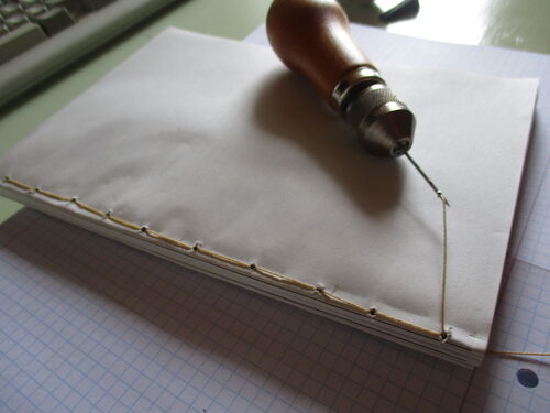 Book bound sewing by hand